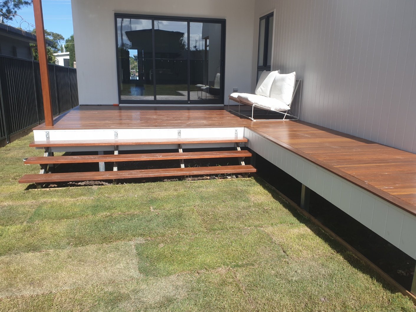 Elevated Australian hardwood timber deck with floating custom steps built by Yushin Kim